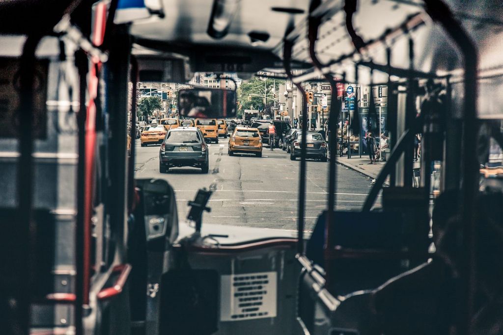 A view from inside a bus driving through new york