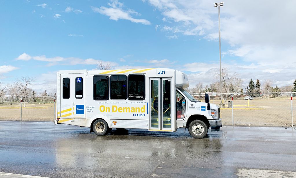 An "On Demand Transit" bus parked outdoors.
